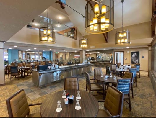 Dining area with tables and serving station
