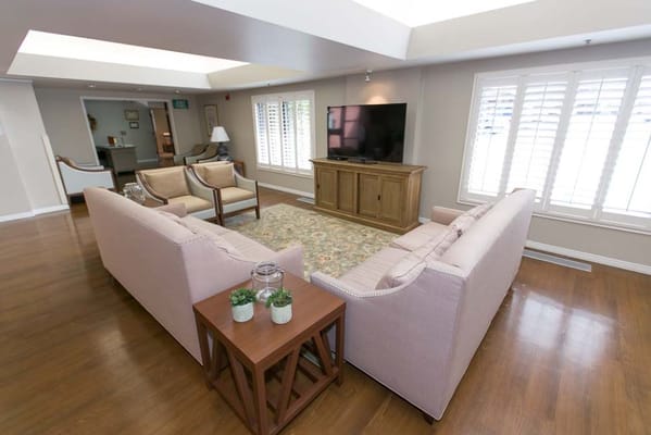 Cozy common area with comfortable seating and a TV