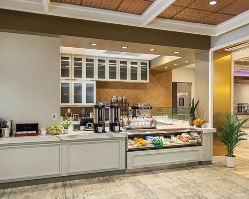 Dining area with coffee and fresh fruit displays