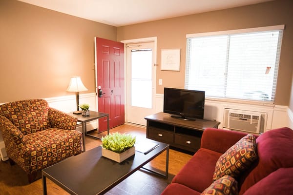 Cozy living room with seating and TV
