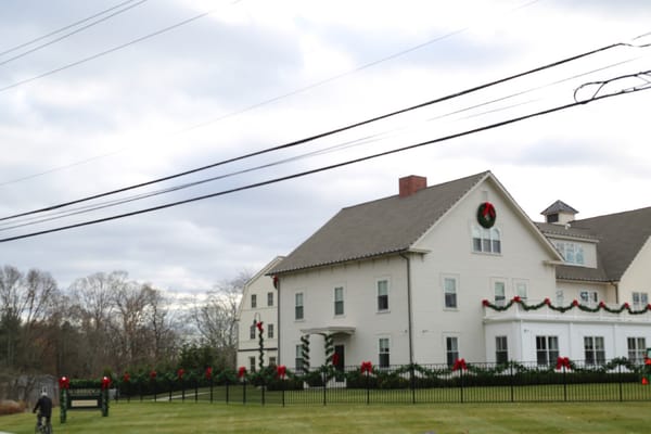 Exterior view of Marbridge Retirement Center decorated for the holidays