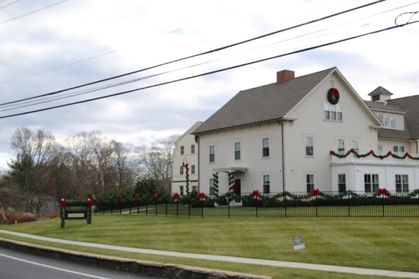 Exterior view of a retirement center decorated for the holidays