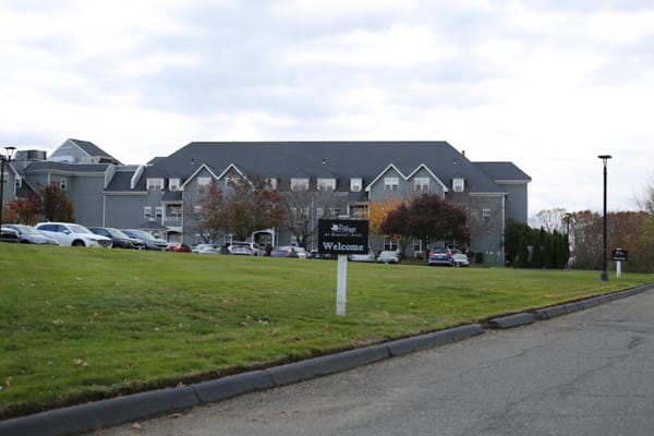 Welcome sign at The Village at Mariner's Point entrance