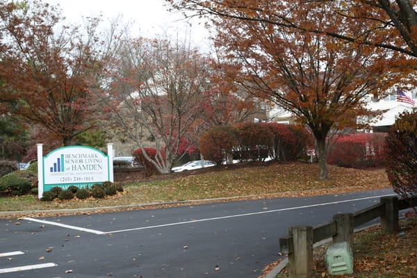 Facility signage outside during autumn