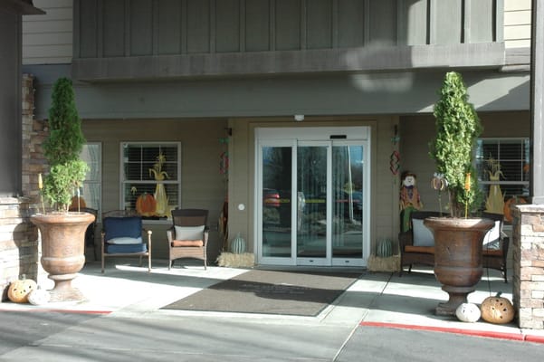 Entrance of MorningStar Senior Living, decorated for fall.