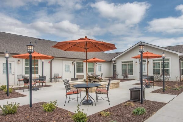 Outdoor courtyard with seating and umbrellas