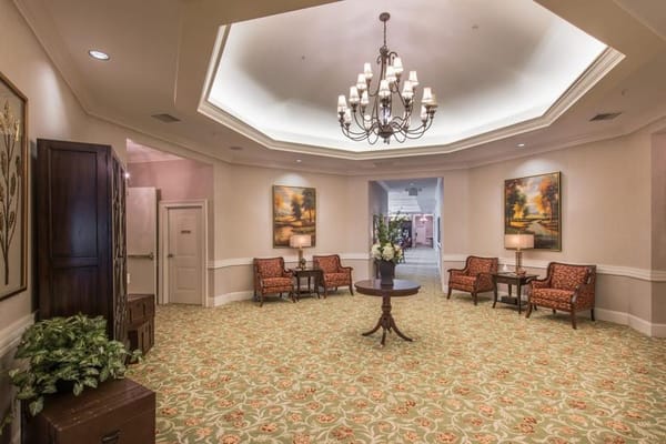 Elegant lobby area with seating and decorations