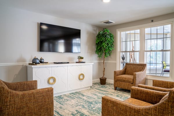 Cozy common area with comfortable seating and TV