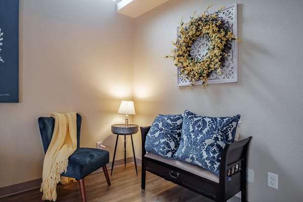 Cozy corner in a resident's room with decor
