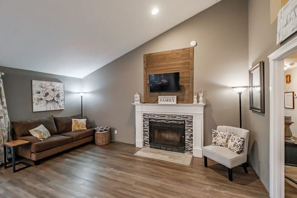 Cozy common area with a fireplace and seating