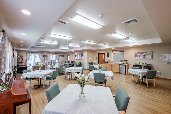 Interior view of a common area with dining tables
