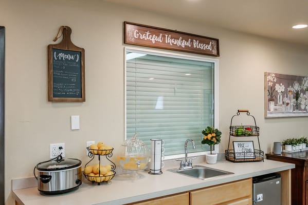 Interior view of a kitchen space with decor and food