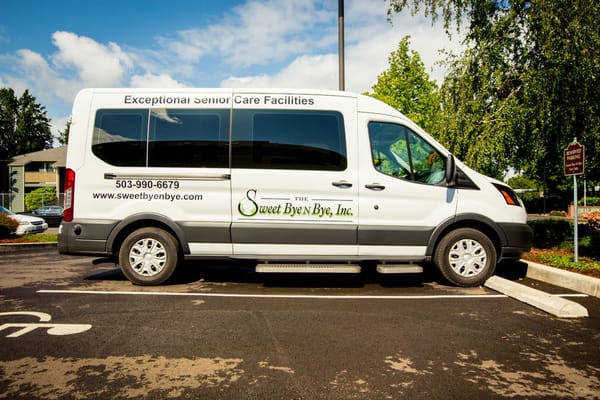 Facility transport van parked in a lot