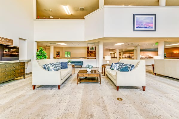 Common area with seating and natural light