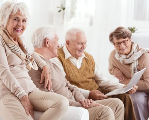 Residents engaging in conversation in a common area