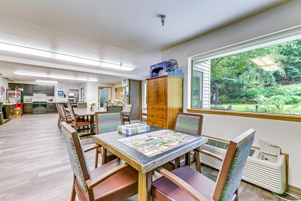 Bright interior dining area with tables and chairs
