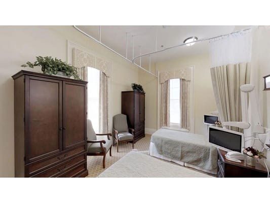 A well-furnished private resident room in the facility