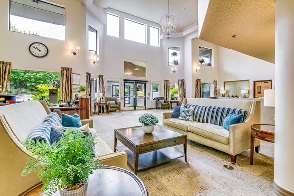 Bright and inviting common area with seating and natural light