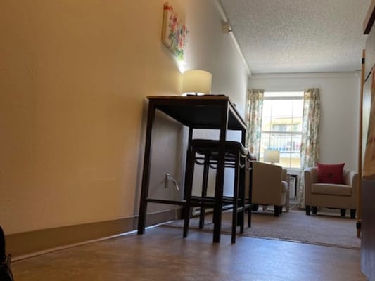 A cozy hallway with table and chairs