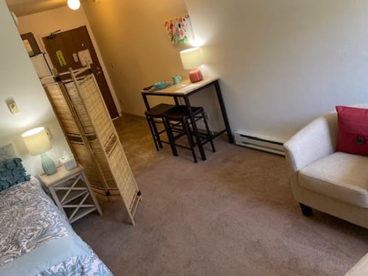 Cozy resident room with furniture and decor