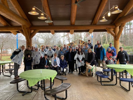 Group of residents and staff at an outdoor event