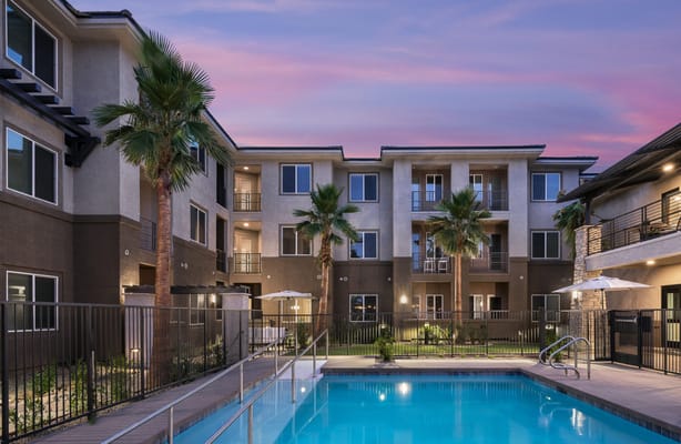 Pool area of a senior living facility at dusk