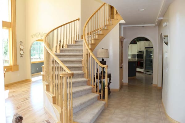 Bright interior with a staircase and light-colored walls