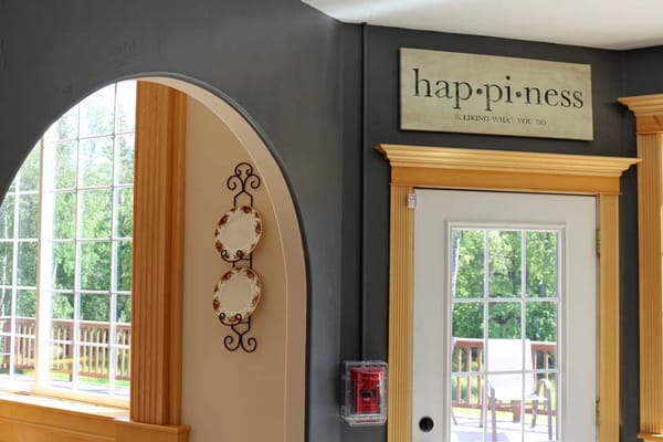 Interior view of a common area with a happiness sign