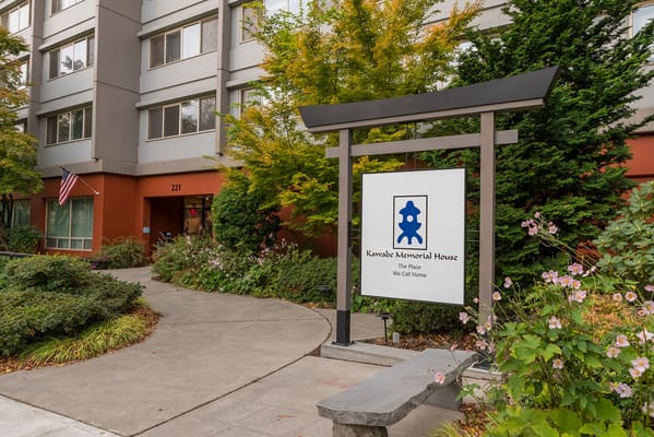 Exterior of Kawabe Memorial House with signage