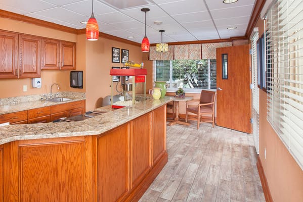 Bright interior common area with a kitchenette