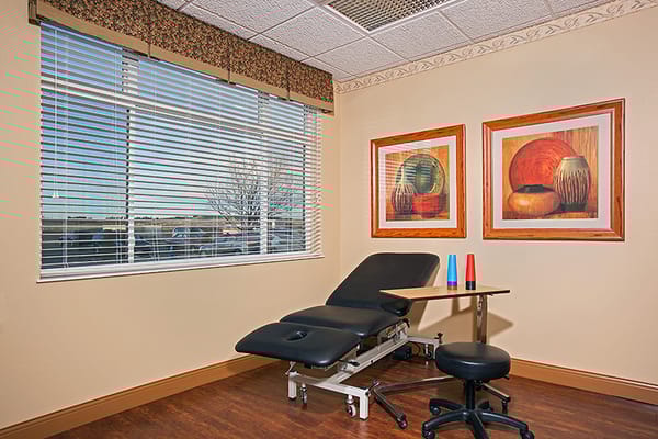 Therapy room with seating and artwork