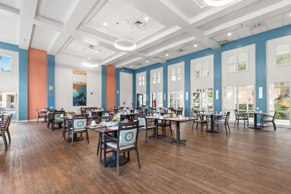 Dining area with tables set for residents