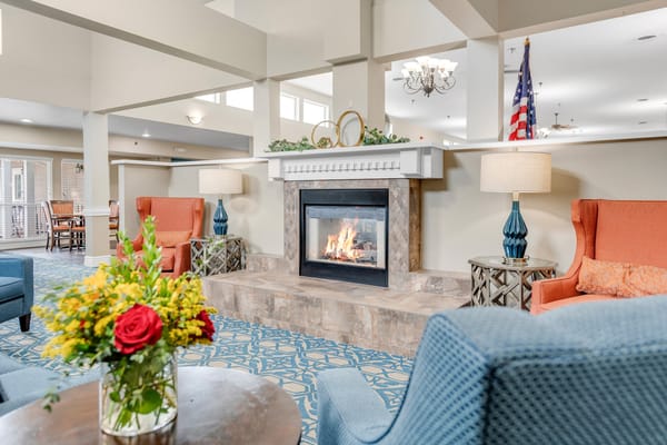 Interior common area with fireplace and seating