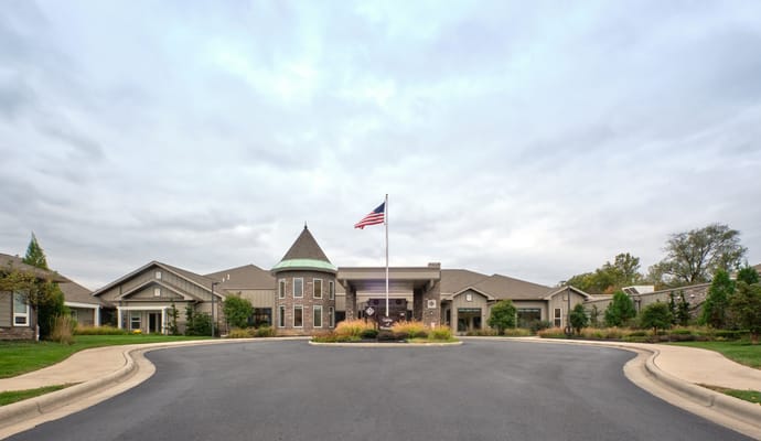 Exterior view of Gables of Westerville with flag and landscaping