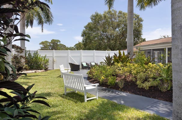 Beautifully landscaped garden area with seating