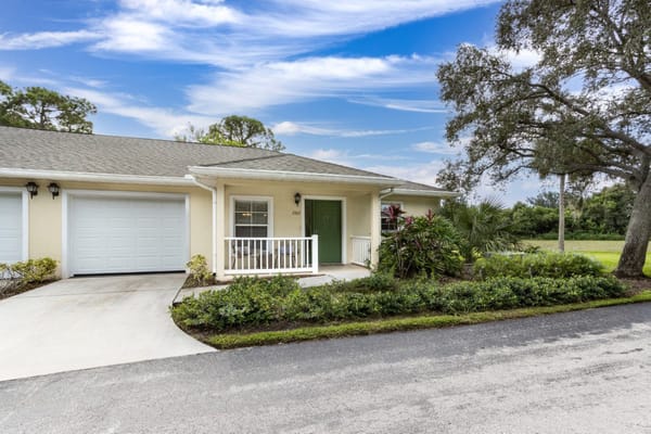 Exterior view of a single-story building with landscaping