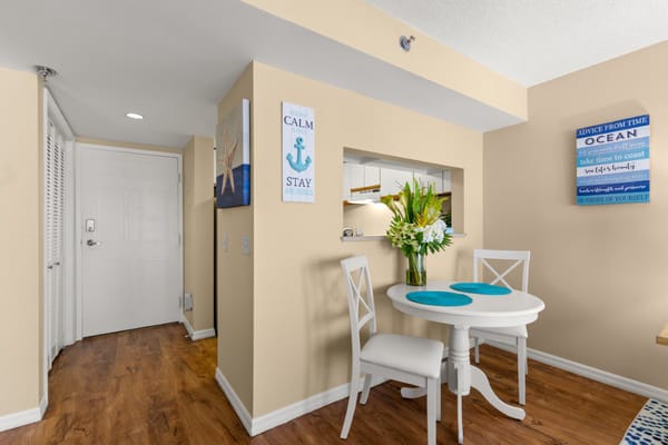 Bright dining area with a table set for two