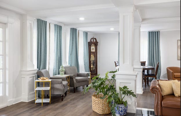 Bright common area with seating and decor