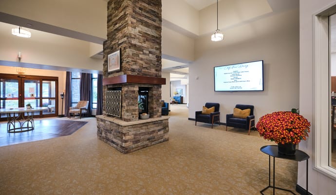 Interior view of a cozy common area with seating and decor