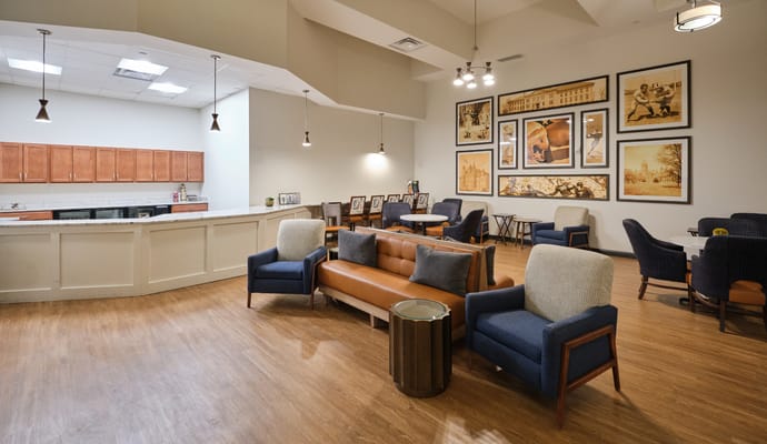 Interior view of a bright common area with seating