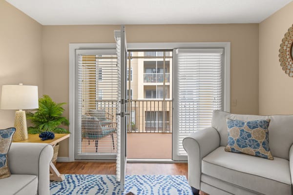 Cozy living area with access to a balcony