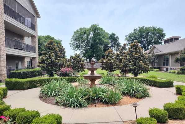 Beautifully landscaped courtyard with a fountain
