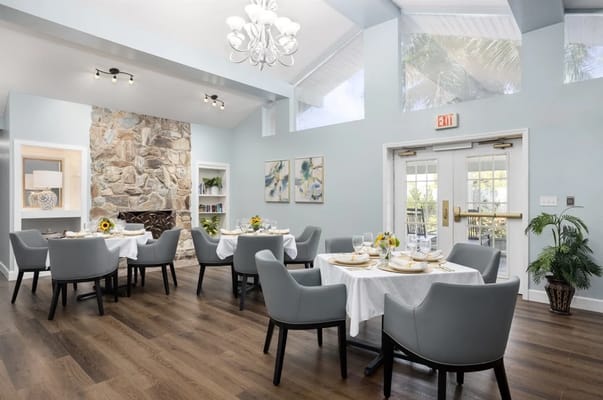 Bright dining room with elegant table settings