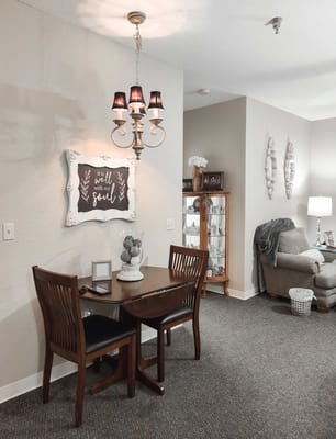 Cozy interior dining area with a chandelier