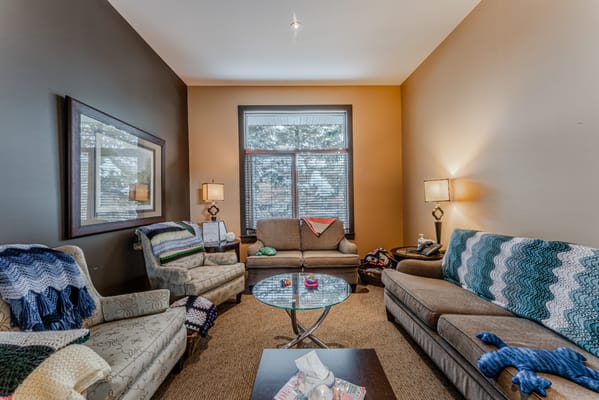 Cozy lounge area with comfortable seating and decor