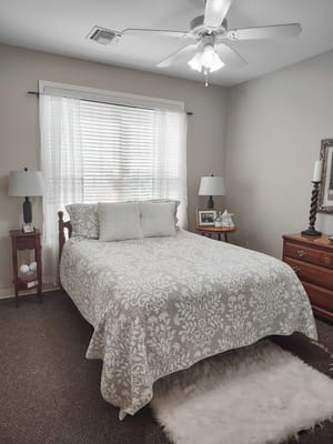 Cozy bedroom with a neatly made bed