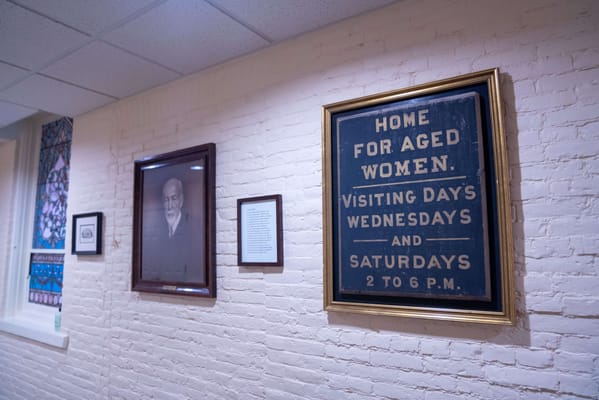 Historical sign in a corridor of a care facility