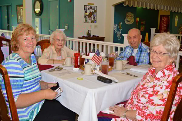 A group of residents enjoying a meal together