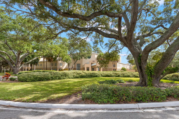 Exterior view of The Barrington surrounded by greenery