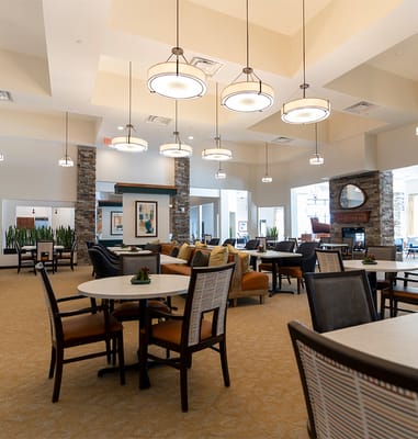 Bright interior of a common area with tables and seating